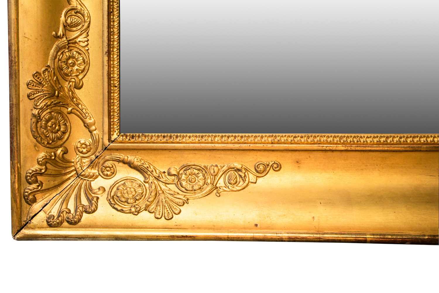 A Regency carved wood and gilt gesso rectangular overmantle mirror. With anthemion and floral boss - Image 2 of 2