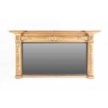A Regency rectangular inerted breakfront carved wood and gilt gesso overmantle mirror. With