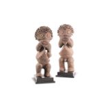Mambila standing male and female figures, Tadep, Cameroon/Nigeria, each encrusted in a thick pigment