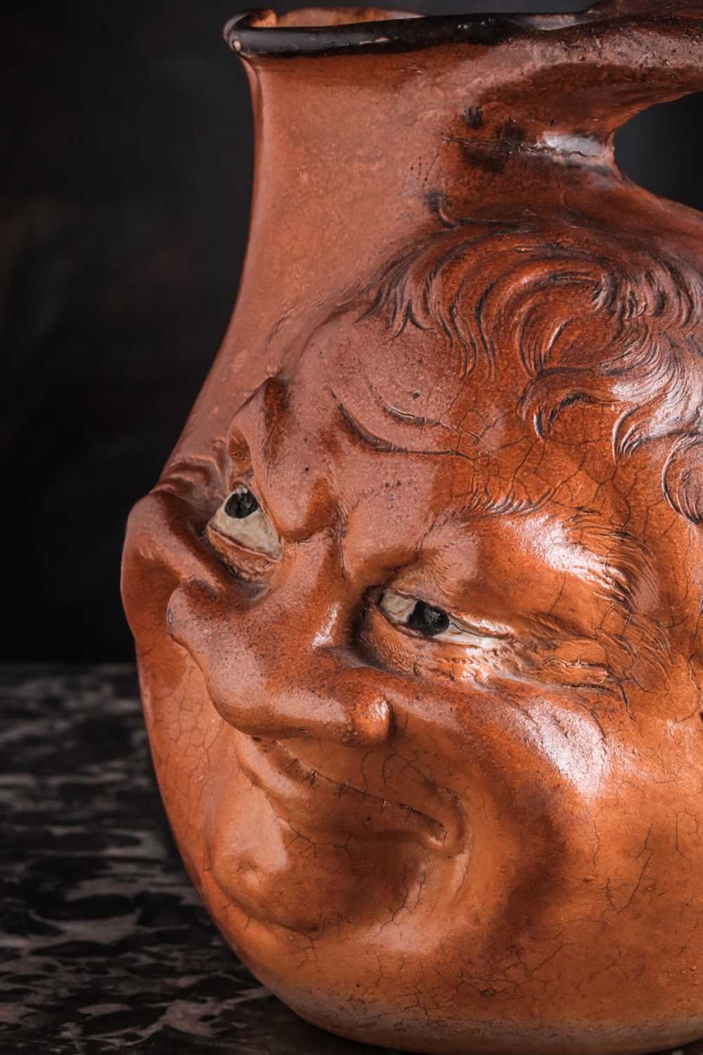 A Martin Brothers large double-sided stoneware face jug, dated 1899, modelled in relief to both - Image 15 of 15