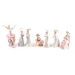 Four Lladro promenading ladies, each with a parasol, and three D'Angila figures, tallest 31.