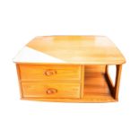 An Ercol golden dawn light elm square "Pandora" coffee table fitted with two short drawers. 80 cm