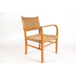 A 1960s Dutch Vroom & Dreesman beechwood easy chair with woven seagrass back and seat. 84 cm high