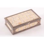 A late 19th-century white metal, rectangular table snuff box with inset panels formed from