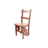 A Victorian golden oak gothic style folding metamorphic chair/ library steps, with pierced