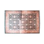 A very large modern hand-knotted dark blue ground Tabriz style carpet with a field filled with