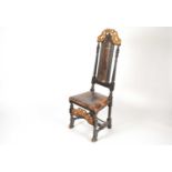 A mostly late 17th century Daniel Marot type walnut side chair with gilt cresting and lightly