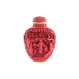 A Chinese cinnabar lacquer snuff bottle, Qing, with petal shaped stopper, decorated with a female in