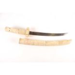 A Japanese Meiji period Wakizashi with bone scabbard grip and tsuba carved with scenes of sages