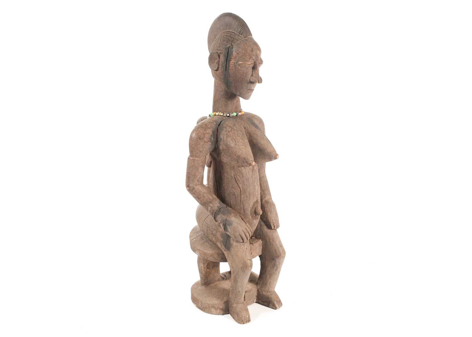 A Baule seated maternity figure, Ivory Coast, with linear and chevron coiffure, scarifications - Image 3 of 4