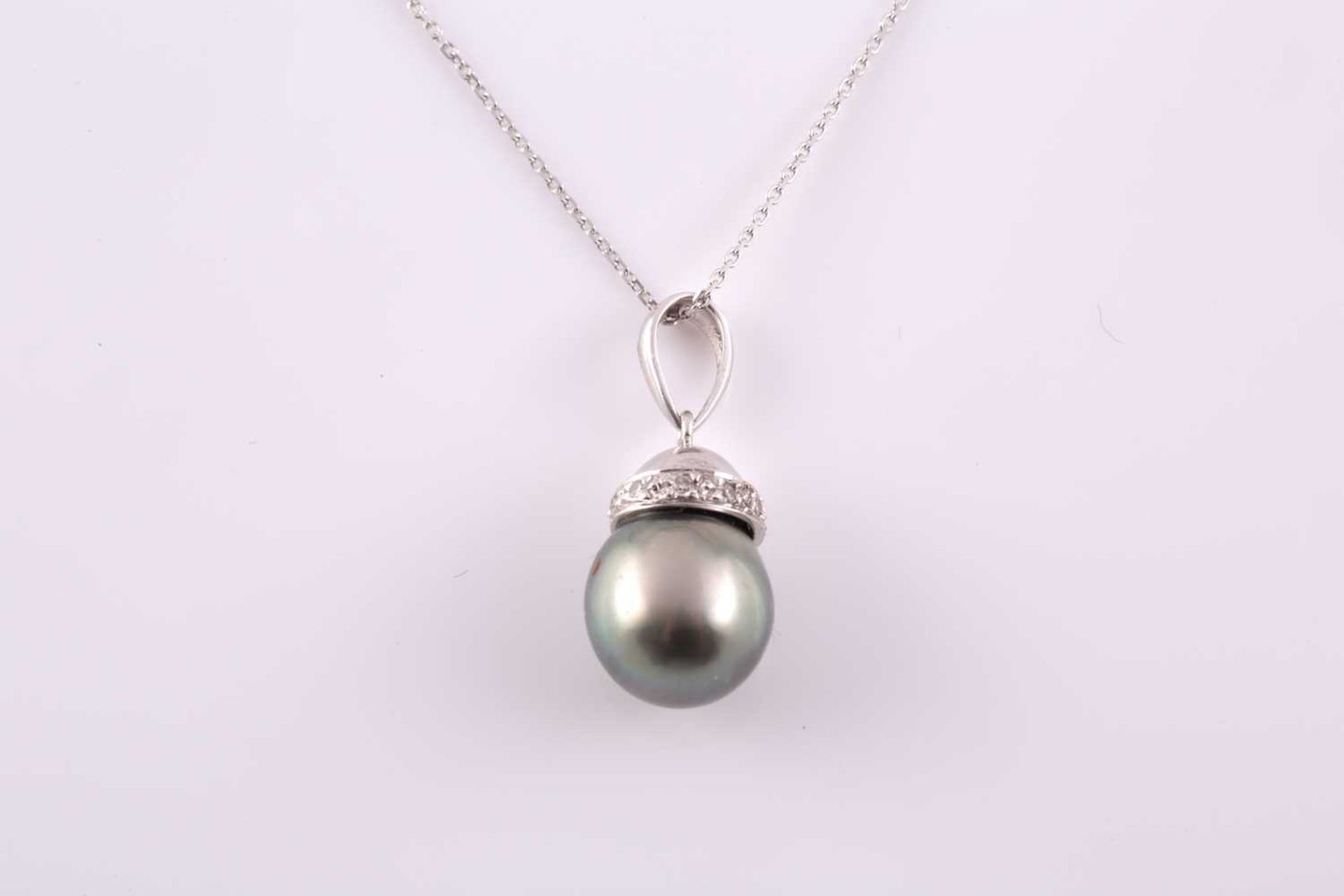 A diamond and grey pearl pendant, the pearl approximately 9.7 mm wide, beneath a diamond-set - Image 2 of 2