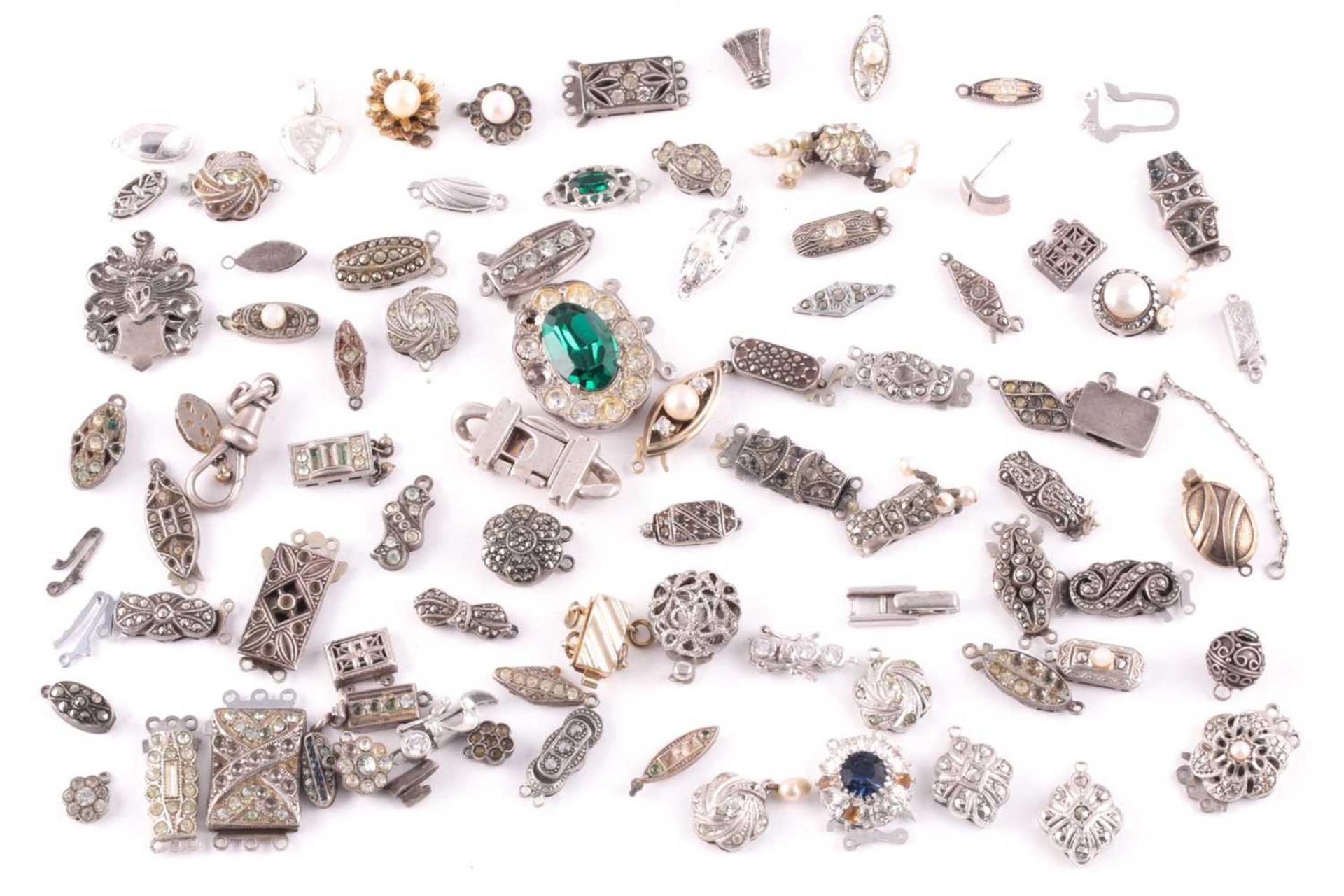 A mixed group of various silver and marcasite set necklace clasps, of various designs and sizes.