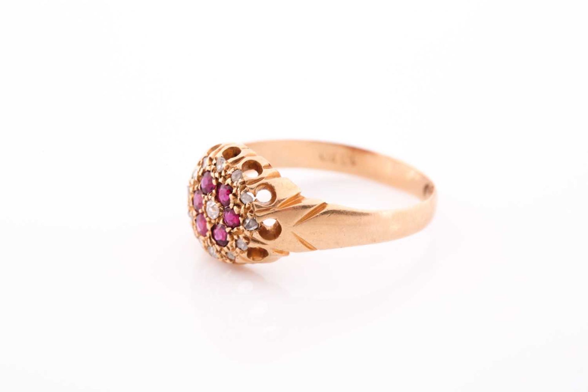 An 18ct yellow gold, diamond, and ruby floral cluster ring, the claw-raised mount pave-set with - Image 5 of 5