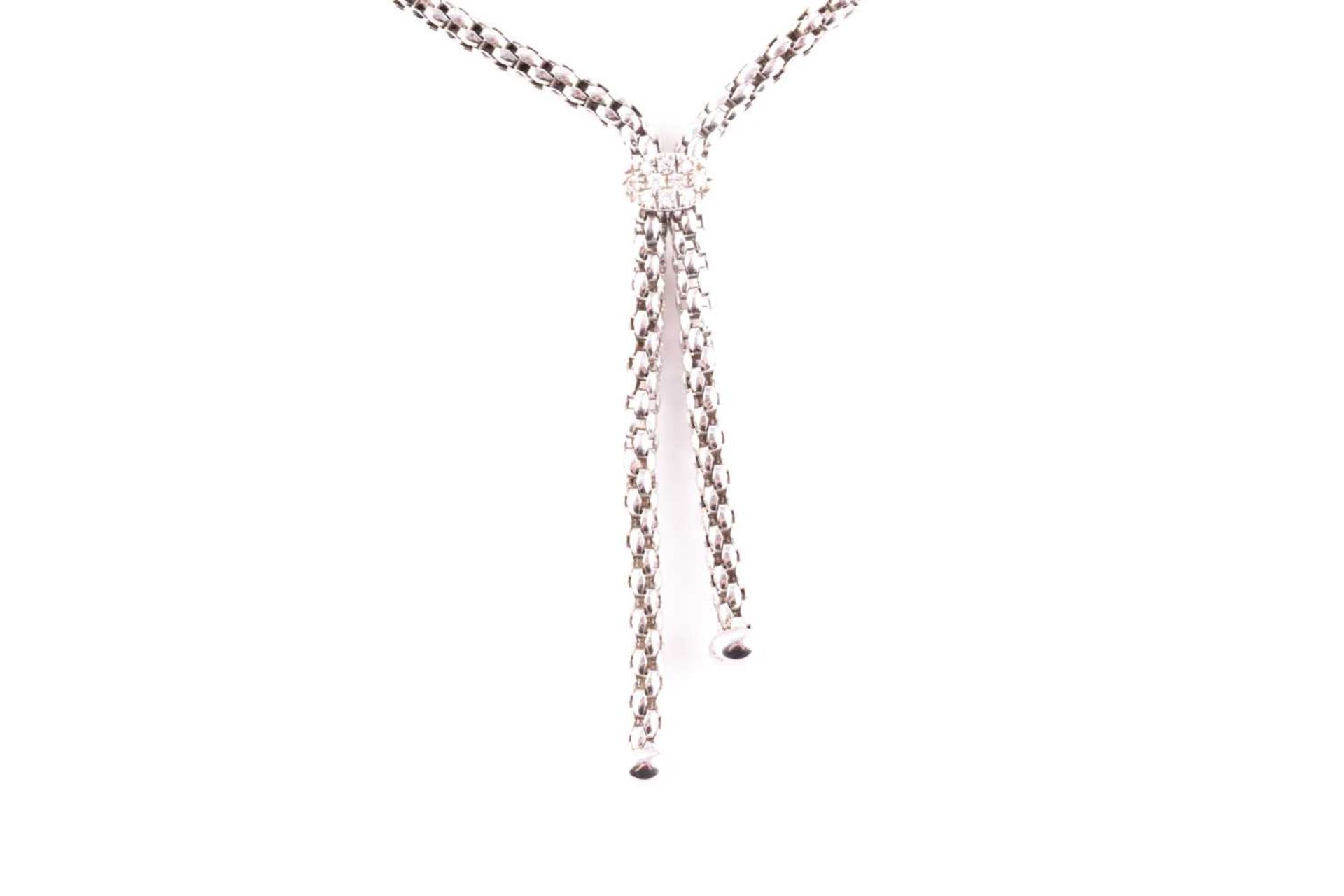 Fope, Italy. An 18ct white gold chain necklace, the lavaliere style with two drops with rounded