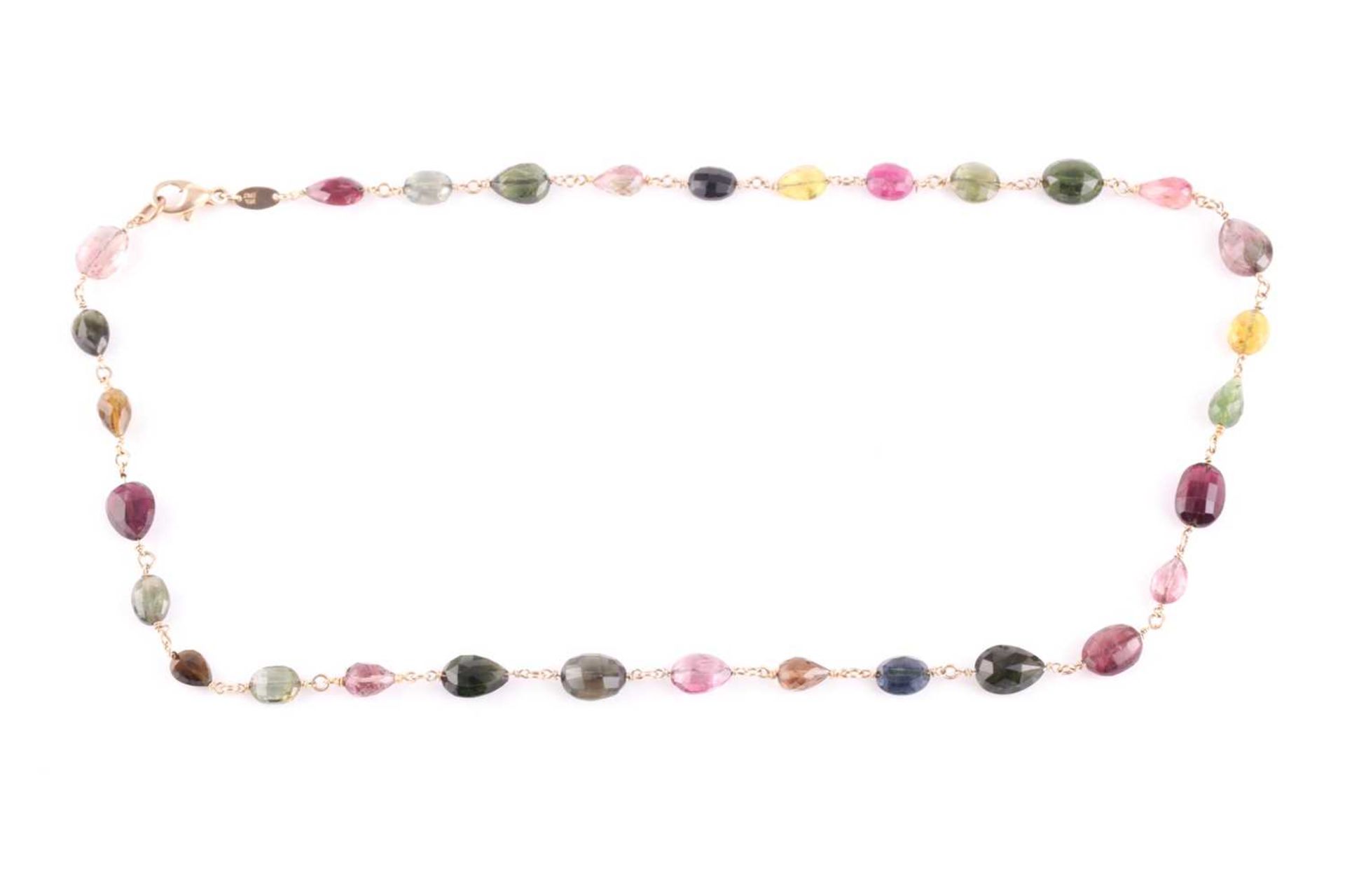 A 14ct yellow gold and varicoloured tourmaline necklace, comprised of briollete-cut pear, oval,