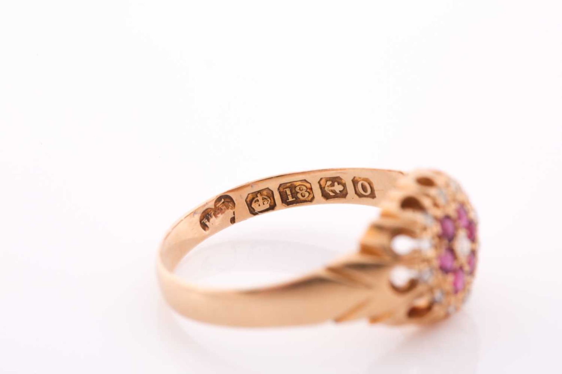 An 18ct yellow gold, diamond, and ruby floral cluster ring, the claw-raised mount pave-set with - Image 3 of 5