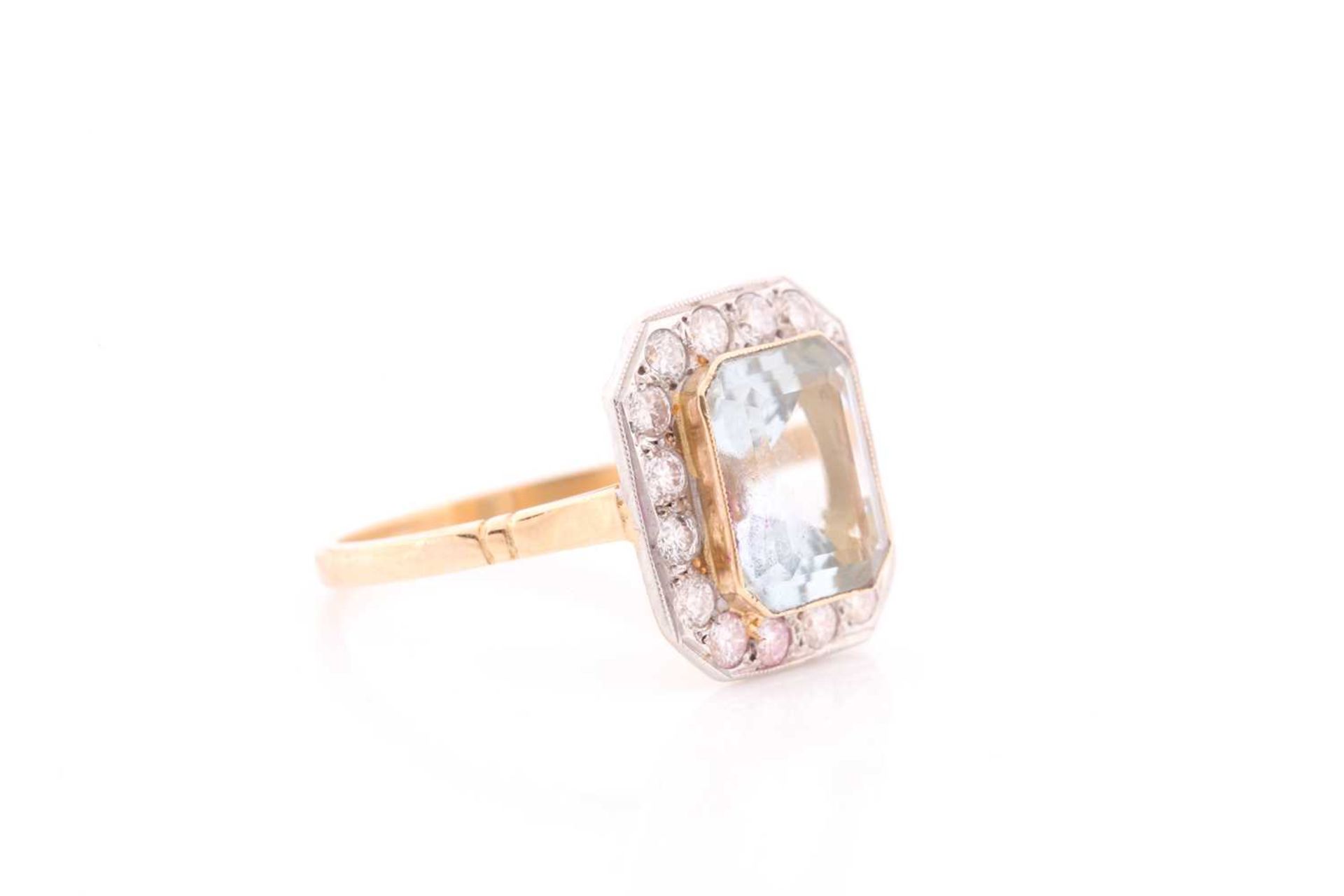 A diamond and aquamarine ring, set with an emerald-cut aquamarine of approximately 2.30 carats, - Image 2 of 4