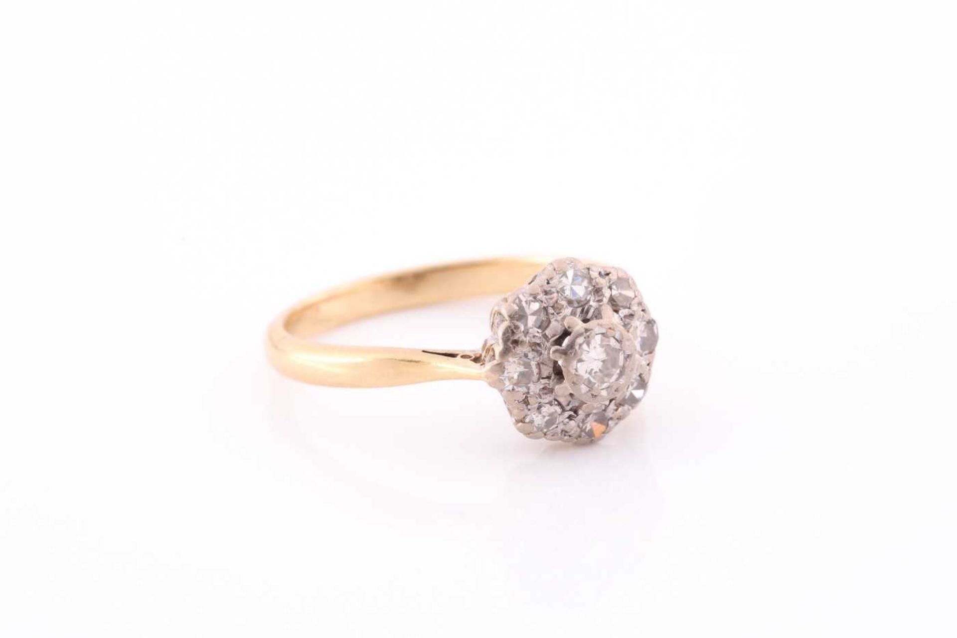 An 18ct yellow gold and diamond cluster ring, set with round eight-cut diamonds, the central stone - Image 2 of 4