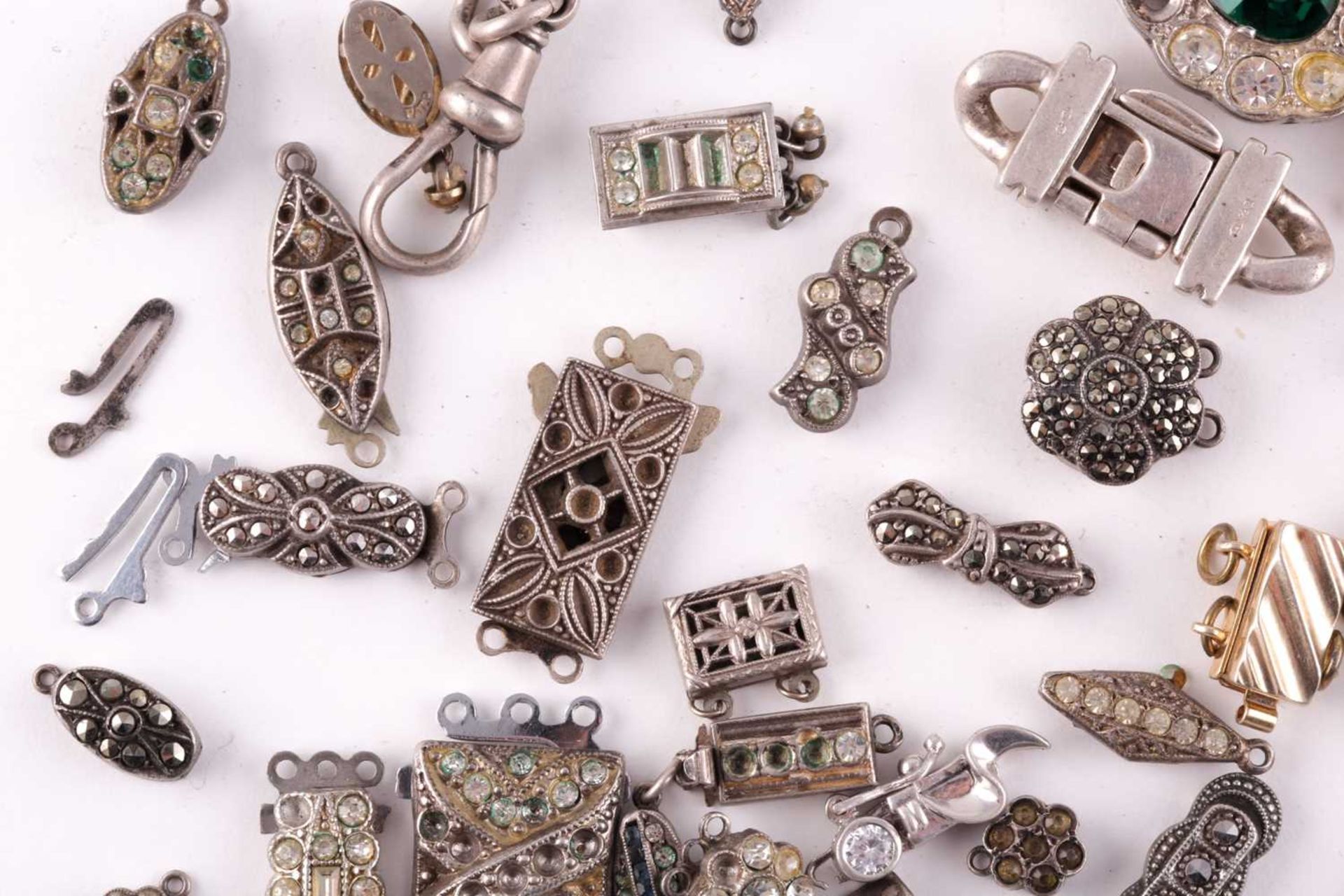 A mixed group of various silver and marcasite set necklace clasps, of various designs and sizes. - Image 3 of 5