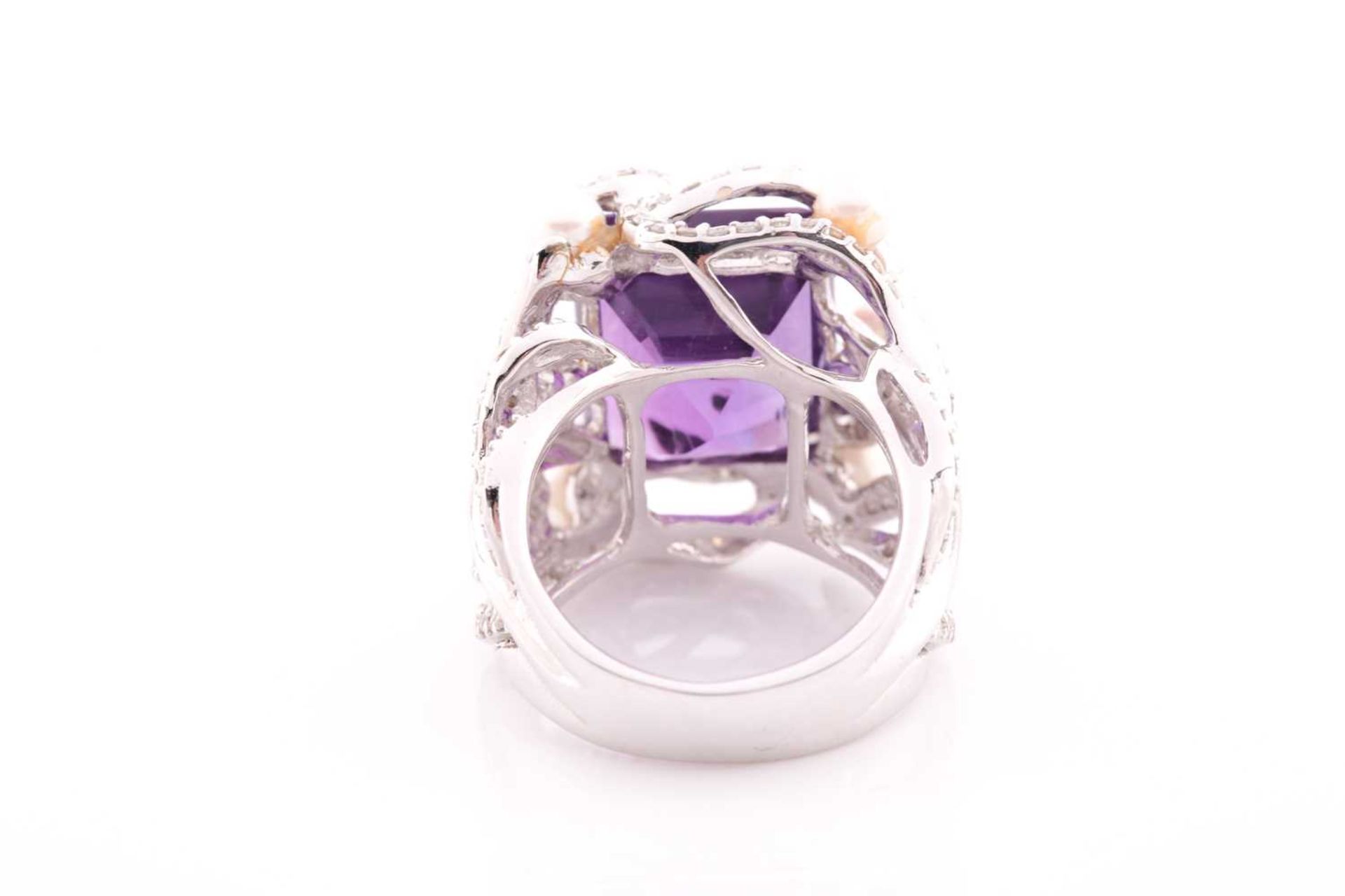 An impressive diamond and amethyst cocktail ring, centred with a mixed square-cut amethyst, - Image 6 of 6