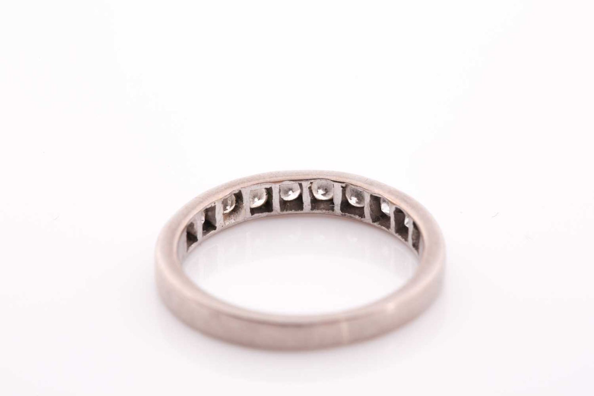 An 18ct white gold and diamond half eternity ring, set with ten round-cut diamonds of - Image 3 of 3