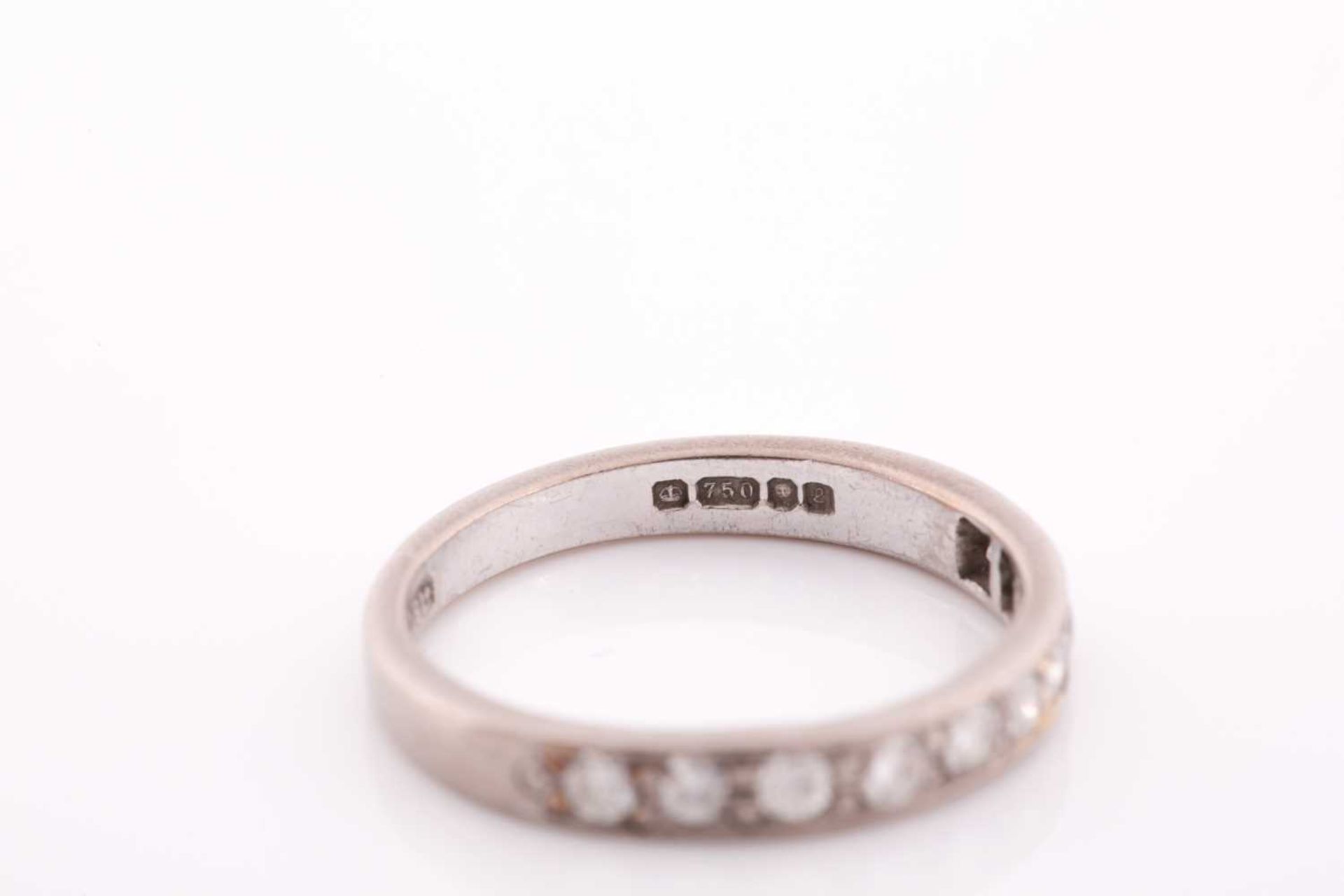 An 18ct white gold and diamond half eternity ring, set with ten round-cut diamonds of - Image 2 of 3