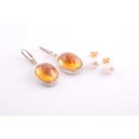 A pair of cultured pearl stud earrings, each approximately 8.0-8.2mm diameter; together with a