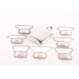 A composite but matching set of seven modern die-stamped silver decanter labels, London 1964 and