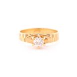 An 18ct yellow gold and diamond ring, set with a round brilliant-cut diamond of approximately 0.40