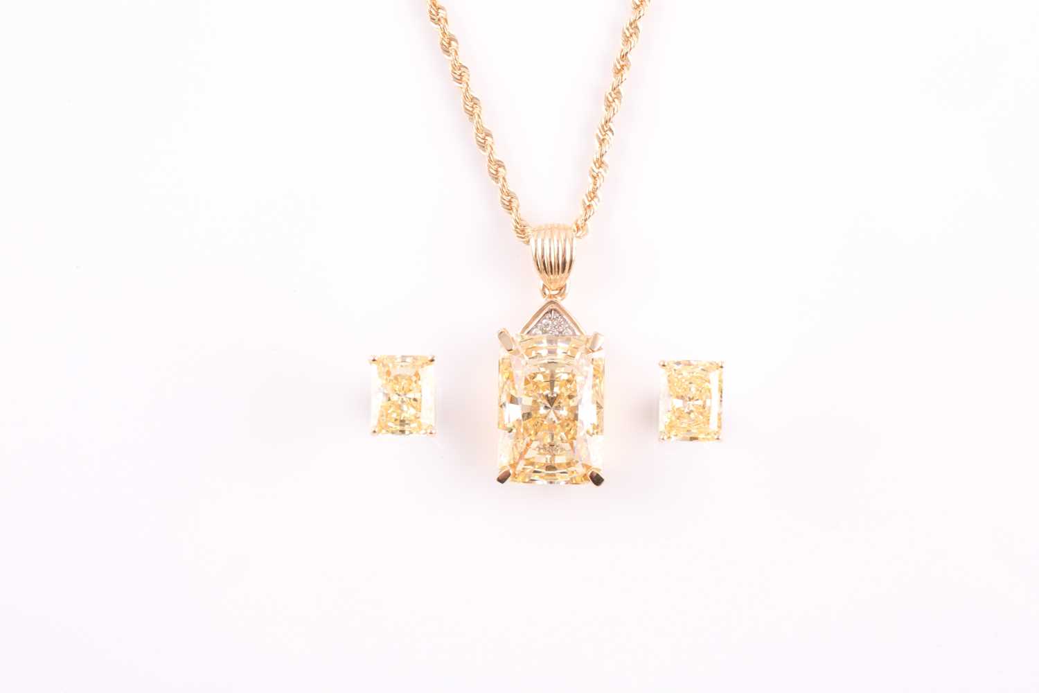 A pair of cubic zirconia stud earrings and a matching pendant and chain, the stud earrings each claw - Image 2 of 8