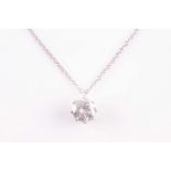 A solitaire diamond pendant, set with a round brilliant-cut diamond of approximately 1.10 carats,