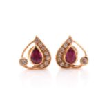 A pair of 18ct gold, ruby and diamond earrings; the heart shaped plaques set with a central pear-