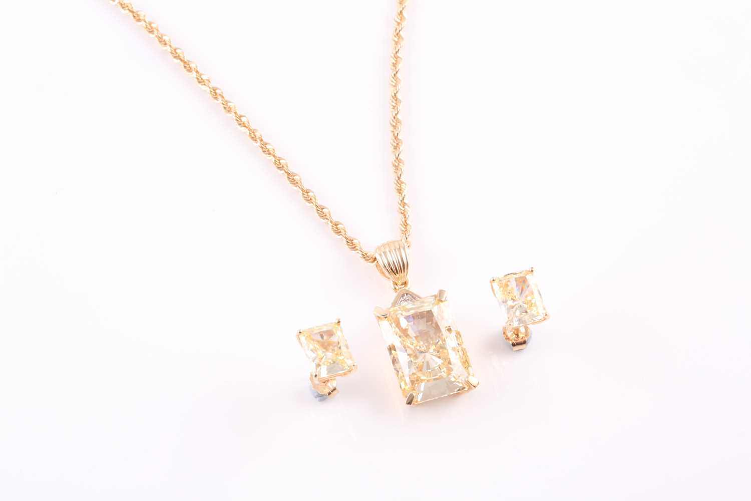 A pair of cubic zirconia stud earrings and a matching pendant and chain, the stud earrings each claw - Image 6 of 8