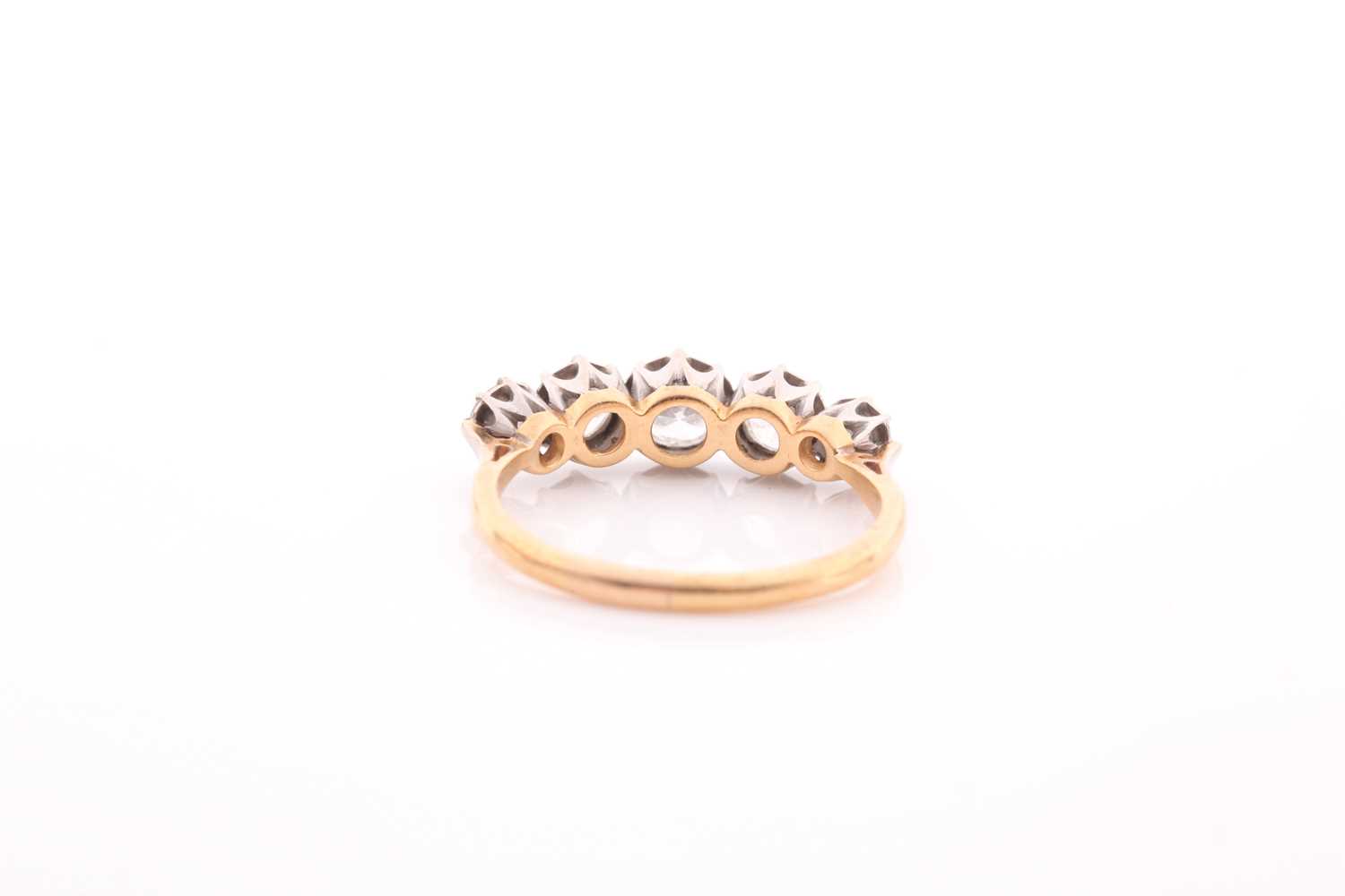 An early 20th century gold and diamond five stone ring, the graduated early round brilliants - Image 5 of 5