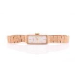 Rotary, a lady’s 9ct gold rectangular bracelet watch, circa 1965, brushed silvered dial with gilt