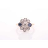 A mid 20th century gold, sapphire and diamond cluster ring, collet-set at the centre with round