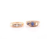 Two early 20th century gold and gem-set gypsy rings, including a small graduated old-cut diamond
