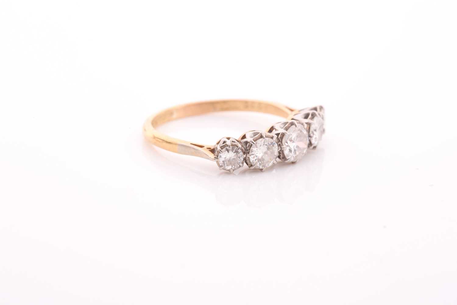 An early 20th century gold and diamond five stone ring, the graduated early round brilliants - Image 2 of 5