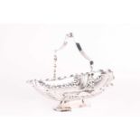 A late Victorian silver pedestal fruit basket with swing-handle, Sheffield 1900 by Fenton Brothers