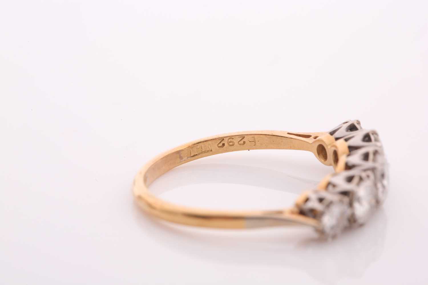 An early 20th century gold and diamond five stone ring, the graduated early round brilliants - Image 4 of 5