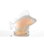A Lalique opalescent frosted glass perch car mascot figure on a circular base, marked with