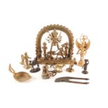 A group of Indian brass figures, 19th/20th century, to include a large Durga group with acolytes,