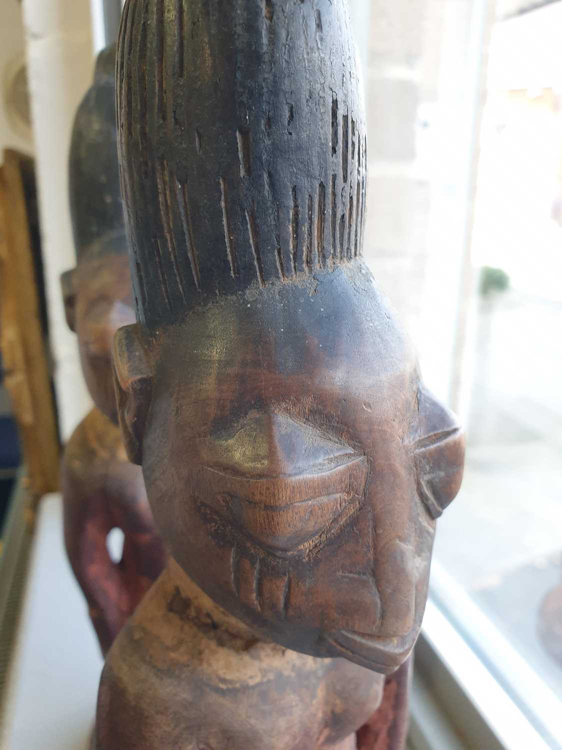 A pair of Yoruba twin male Ibeji figures, Nigeria, each with tall linear carved coiffure with traces - Image 6 of 20