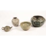 Four pieces of British studio pottery, comprising a jardiniere (19 cm high x 31 cm wide), a