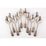 A matched set of ten silver fiddle pattern tablespoons. Including London 1923 by James Beebe and