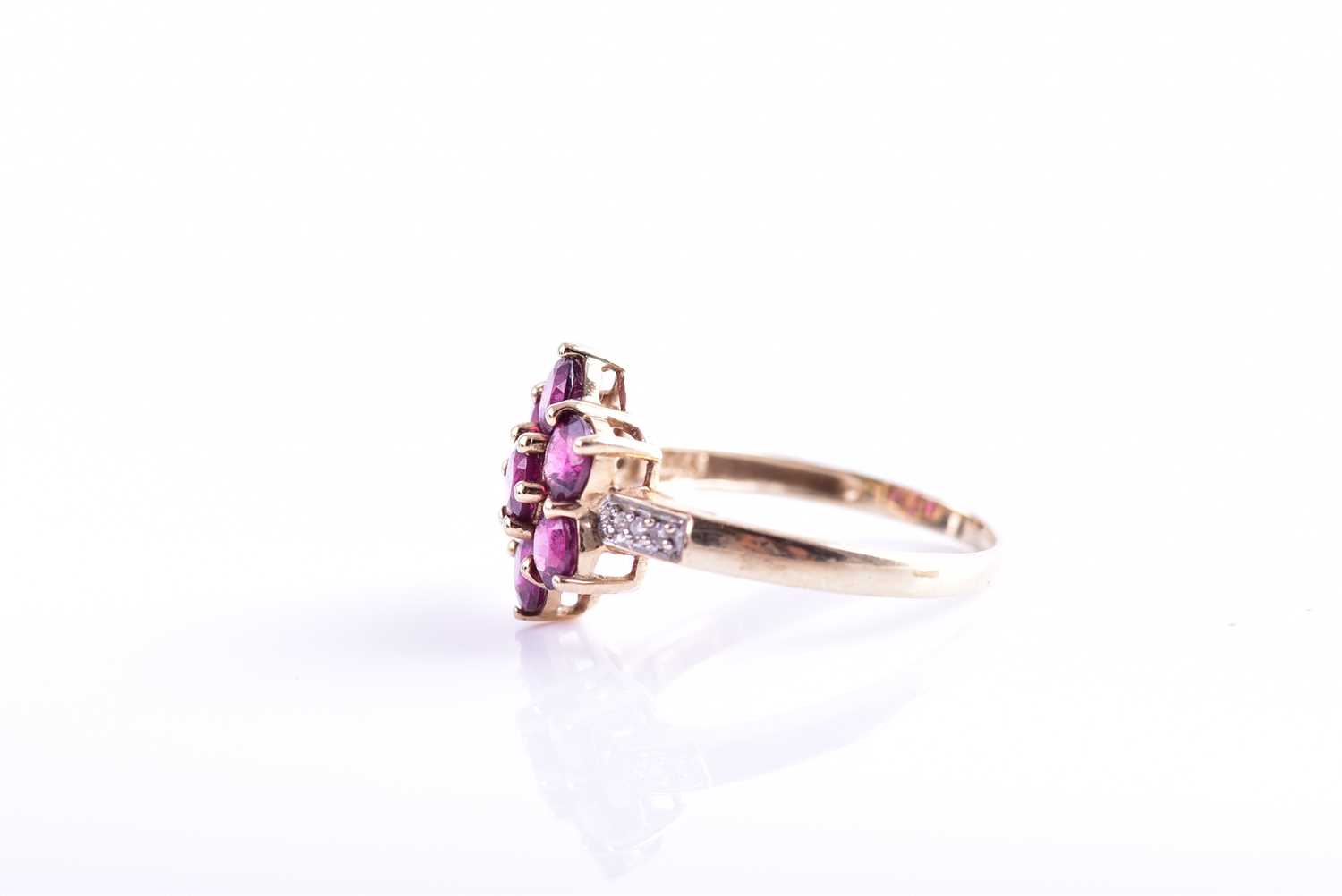 A 9ct yellow gold, diamond, and rhodalite garnet floral cluster ring set with seven round-cut - Image 3 of 4