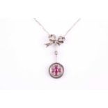 A Belle Epoque ruby and diamond necklace, with a ribbon-shaped, diamond set, bow suspending a