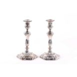 A pair of silver George IV table candlesticks. Sheffield 1825 by John & Thomas Settle, Gunn & Co.