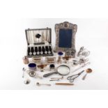 A collection of small silver and plated items in including a pair of boat form silver pedestal salts