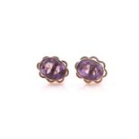 A pair of amethyst stud earrings, the oval mixed cut amethysts rub over set in 9 carat gold with